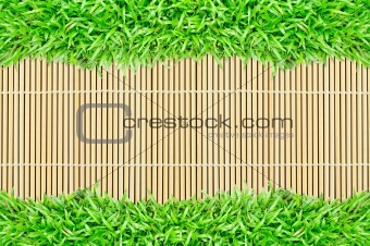 grass frame on bamboo texture background