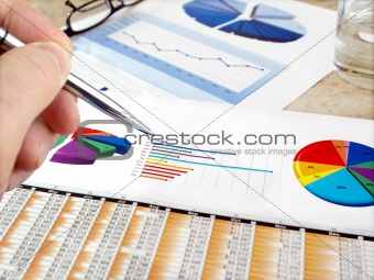 Analyzing investment charts.