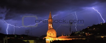 Lightning over Alba and surrounding hills in Italy.