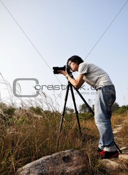 Photographer taking photo at wild