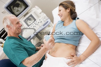Doctor Giving Patient An Ultra Sound 