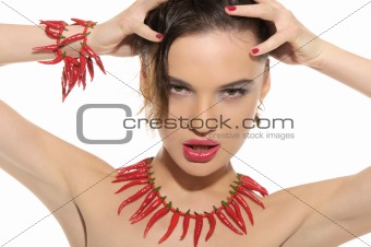 Sexy woman with jewelry of hot pepper