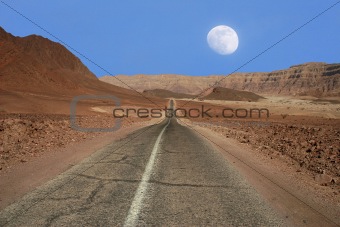 Narrow road through the desert in Israel.