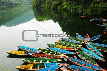 Colorful tour boats at lakeside