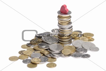 heap and stack of uah coins isolated on white background