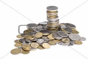 heap and stack of uah coins isolated on white background