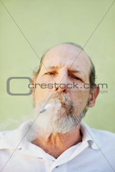 aged caucasian man smoking cigarette 