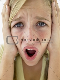 Portrait Of Teenage Girl Screaming