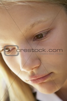 Portrait Of Girl Looking Unhappy