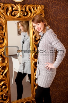 Beautiful girl infront of a mirror