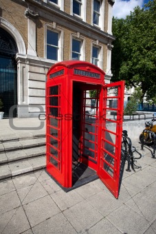 Old red telephone box in London