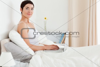 Cute woman using a laptop