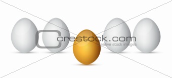 Row of white eggs with golden one