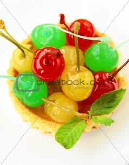 dessert tartlet with colored cocktail cherries