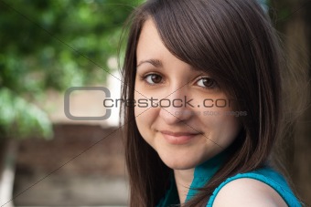 Portrait of a beautiful young brunette with hazel eyes