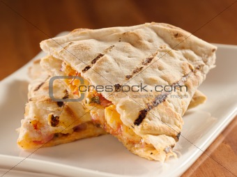 plate of chicken and cheese quesadillas