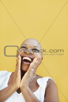 mature african woman smiling for joy 
