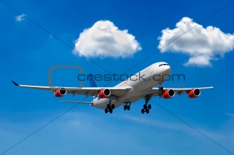 Big airliner and clouds