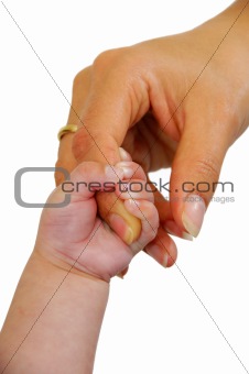 Baby and mothers hand