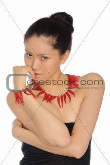 asian woman with  jewelry of red peppers