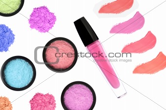 multicolored cosmetics eyeshadows in the box and lipstick (lipgl
