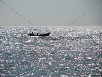 Boat and Glittering Sea