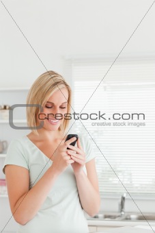 Cute woman with a mobile