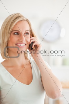 Close up of a charming woman on mobile