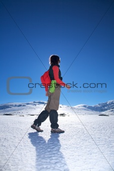 side red hiking woman