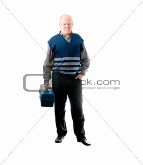 Confident man standing with toolbox in right hand