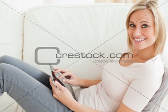 Close up of a woman with a tablet computer