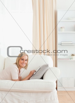 Portrait of a charming woman with a tablet computer