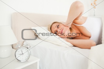 Tired woman waking up