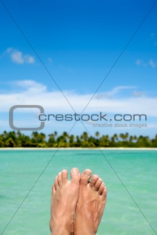 Feet, water and exotic beach
