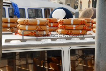 Stacks of life belts on boat