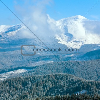 Morning cloudy winter mountain landscape.