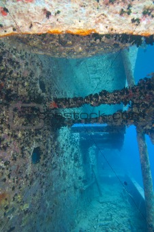 Companionway on a large shipwreck with reflection