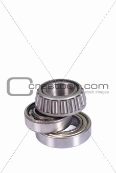 Three different type ball bearings isolated on white background vertical with copyspace