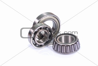 Different type ball bearings isolated on white background with copyspace