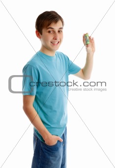 Happy boy holding rolled up cash