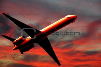 Air travel - plane and sunset