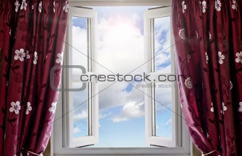 Modern window open with a view to sky and sun