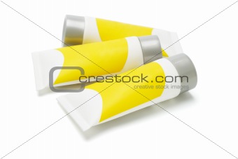 Three tubes with yellow labels