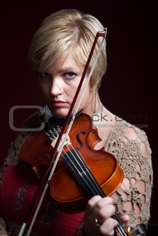 Woman Plays a Violin