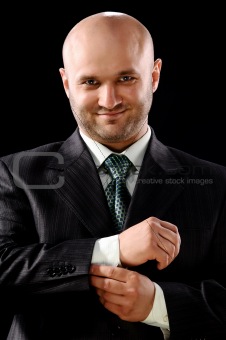 The businessman on a black background
