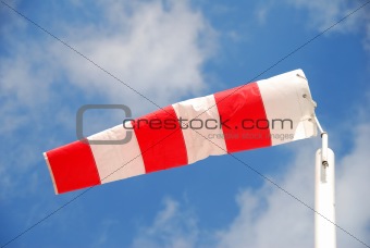 Directional flag blowing in the wind