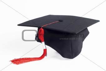 graduation cap with a red tassel