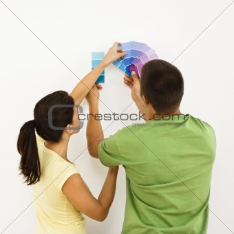 Couple choosing home color.
