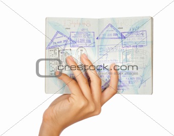 Hand showing passport, close-up shot