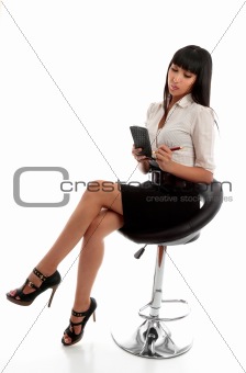 Businesswoman taking dictation or notes